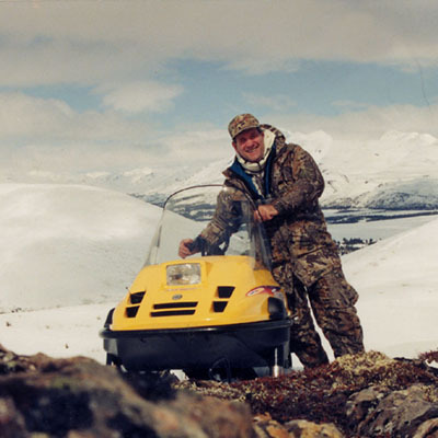 Joe on top of a mountain